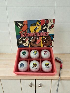 vintage 6-piece set of collectible Looney Tunes golf balls from Precept